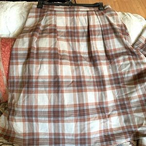 Cremiux suit jacket and knee length skirt.  New with tags.  Never worn, size 14.